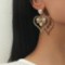 Retro Exaggerated Hollow Pearl Twist Love Stud Earrings